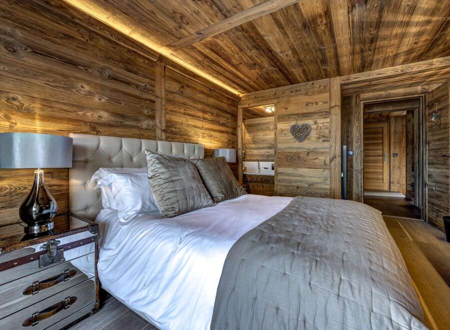Experience rustic luxury in this stunning bedroom.