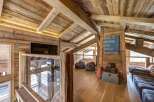 Experience rustic luxury in this stunning wooden-clad property.