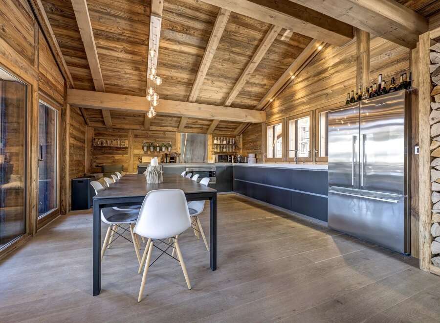 Experience rustic elegance in this stunning chalet-style kitchen.