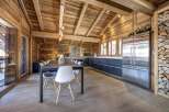 Experience rustic elegance in this stunning chalet-style kitchen.