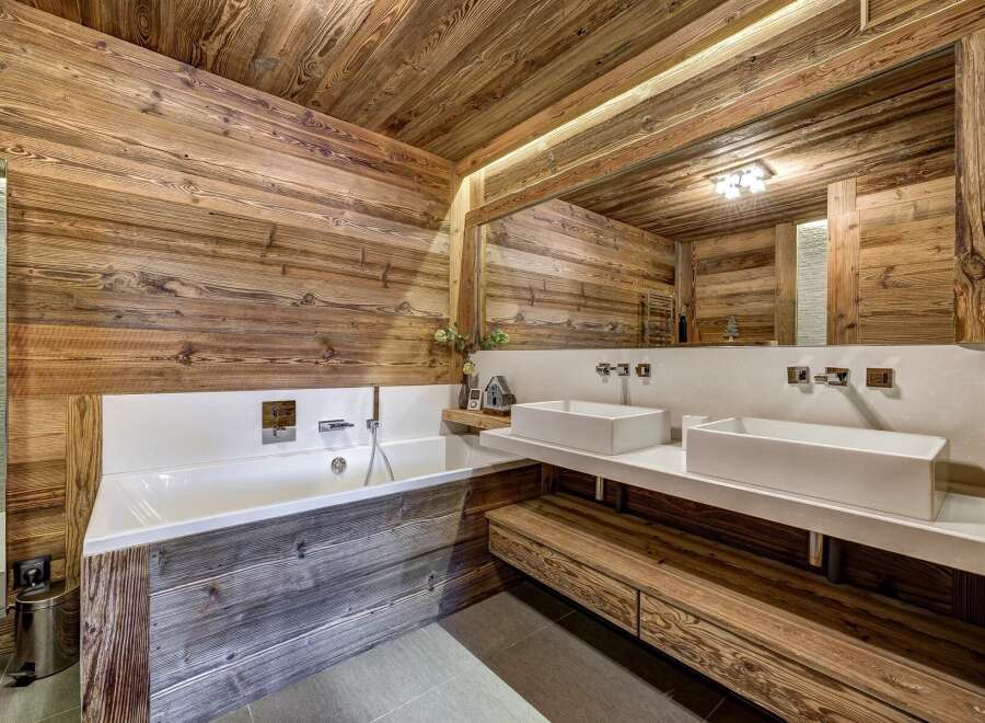 Experience rustic luxury in this stunning bathroom.