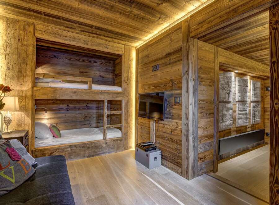 This stunning property features a cozy bunk bed setup, perfect for accommodating guests or family.