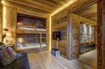 This stunning property features a cozy bunk bed setup, perfect for accommodating guests or family.