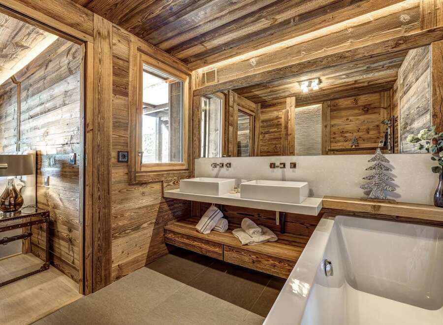 Experience rustic luxury in this stunning bathroom.