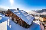 Discover the charm of this stunning chalet nestled in a picturesque winter wonderland.