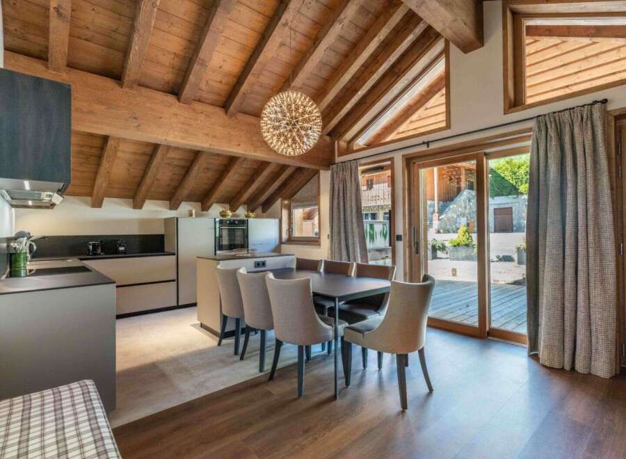 Experience the charm of this stunning property, featuring a beautifully designed kitchen and dining area.