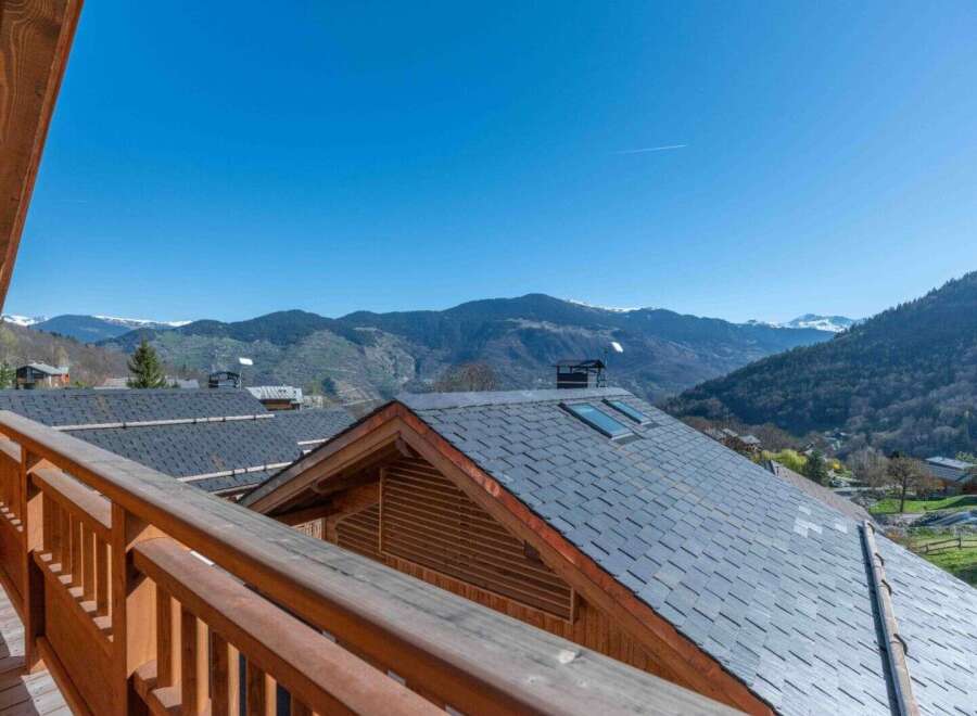 Enjoy breathtaking mountain views from this charming property.