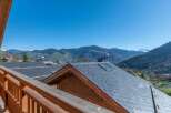 Enjoy breathtaking mountain views from this charming property.
