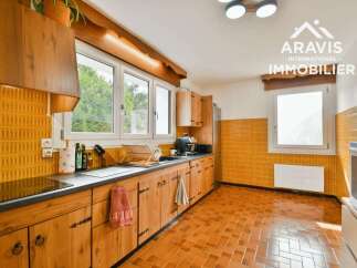 Step into this charming kitchen, featuring warm wooden cabinetry and a classic design.