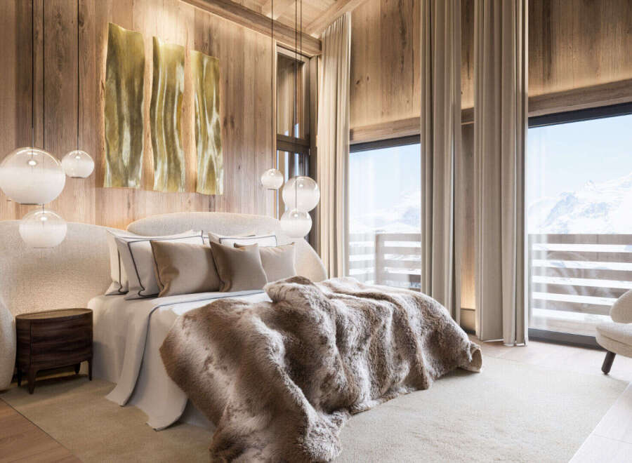 Experience luxury living in this stunning bedroom, featuring a cozy bed adorned with plush bedding and a faux fur throw.