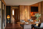 Experience luxury living in this stunning property, featuring exquisite wooden accents and a warm, inviting atmosphere.