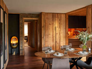 Experience luxury living in this stunning property, featuring exquisite wooden accents and a warm, inviting atmosphere.
