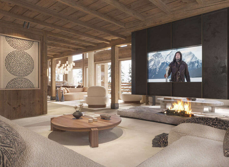 Experience luxury living in this stunning chalet-style home, featuring a cozy living room with a fireplace and a large-screen TV.
