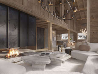 Experience luxury mountain living in this stunning chalet, featuring a grand fireplace and expansive open-plan living space.