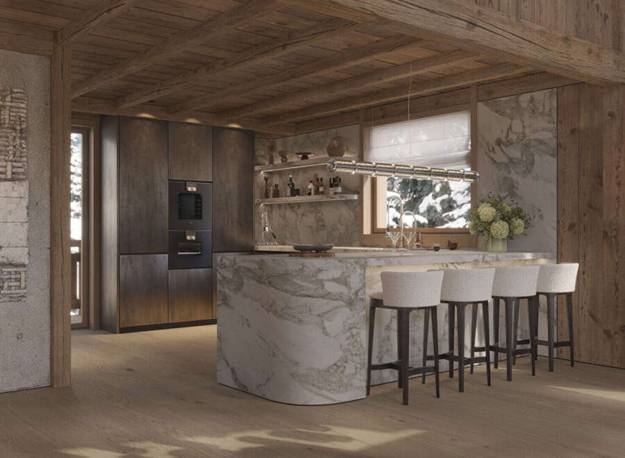 Experience luxury mountain living in this stunning chalet kitchen, featuring a dramatic marble island and sleek, dark cabinetry.