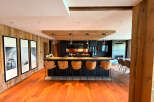 Experience luxury mountain living in this stunning open-concept kitchen and dining area.