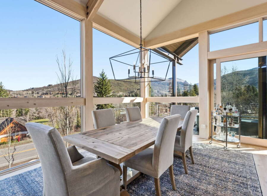 Experience breathtaking views from this stunning dining room.
