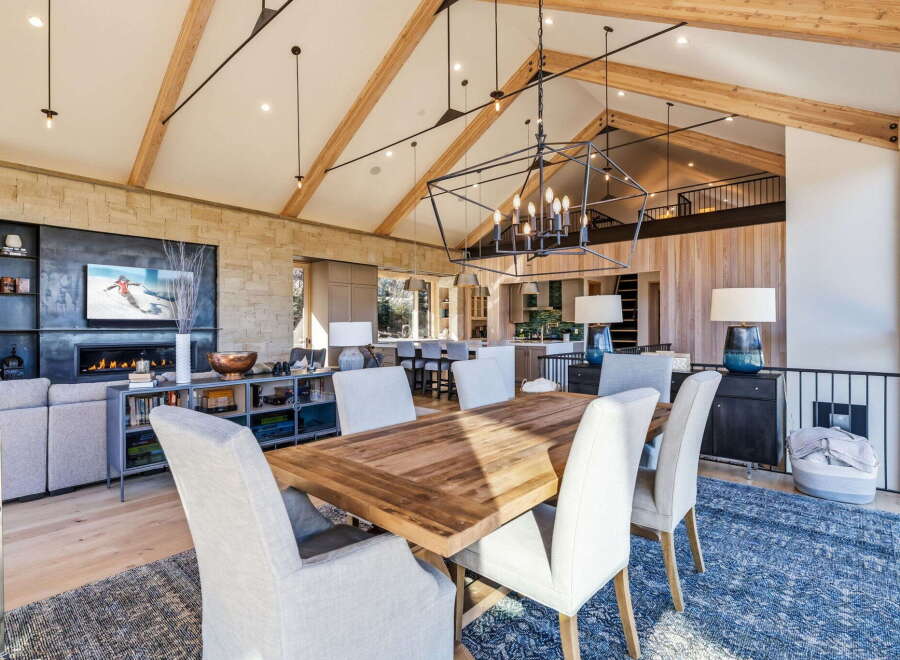 Experience luxury living in this stunning property featuring a spacious dining area.