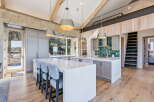 This stunning kitchen boasts a modern design with high-end finishes.