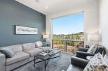 Experience luxury living with this stunning property, boasting a spacious living area with breathtaking views.