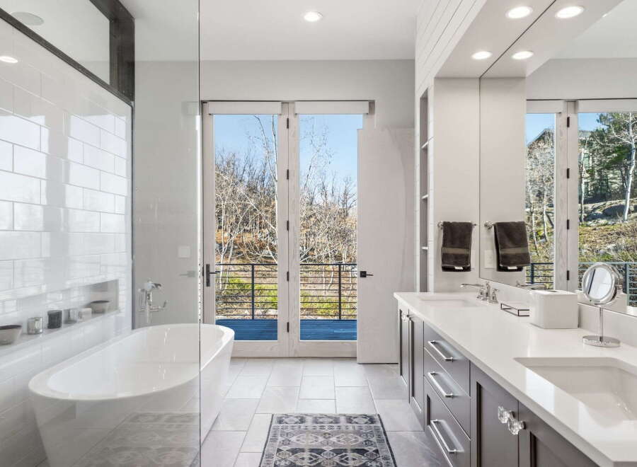 Step into luxury with this stunning bathroom featuring a modern design and high-end finishes.