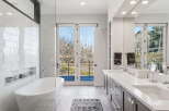 Step into luxury with this stunning bathroom featuring a modern design and high-end finishes.
