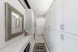 Step into luxury with this stunning walk-in closet.