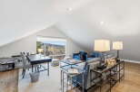 This stunning property boasts a modern and airy living space, perfect for relaxation and entertainment.