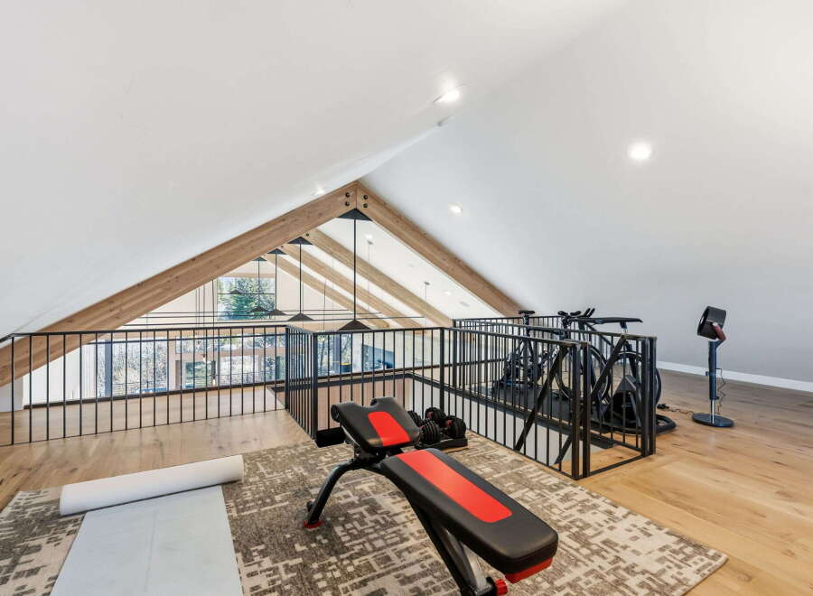 This stunning property boasts a modern home gym, perfect for staying active and healthy.