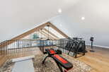 This stunning property boasts a modern home gym, perfect for staying active and healthy.