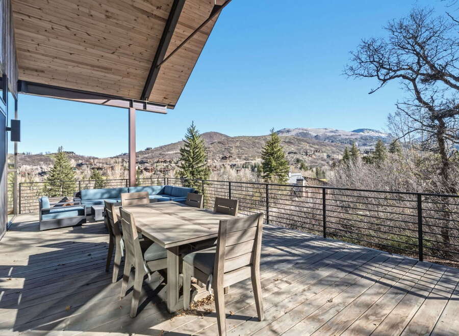 Enjoy breathtaking mountain views from this stunning outdoor deck.