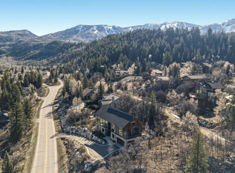 Nestled in a serene mountain landscape, this stunning property offers unparalleled views and luxurious living.