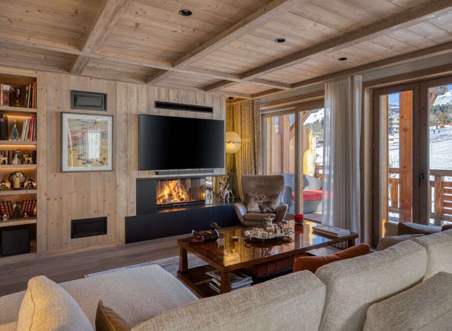 Experience luxury living in this stunning property featuring a cozy fireplace, perfect for chilly evenings.