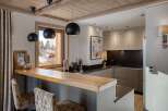 This stunning kitchen boasts a modern design with a touch of rustic charm.