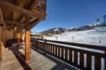 Enjoy breathtaking mountain views from this stunning ski chalet.