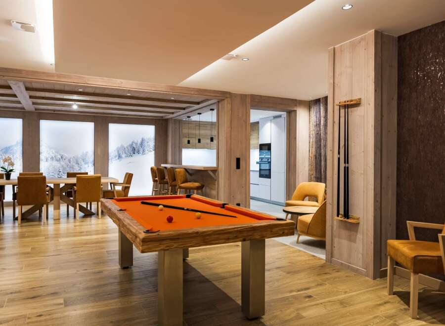 This luxurious property boasts a stunning game room, perfect for entertaining guests.
