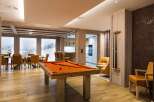 This luxurious property boasts a stunning game room, perfect for entertaining guests.