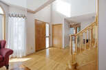 Step into this inviting home with stunning hardwood floors and a grand staircase.