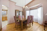 Step into this elegant dining room, perfect for hosting memorable gatherings.