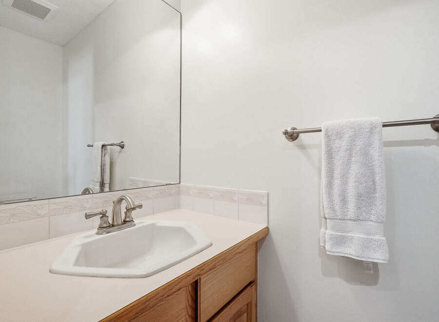 This bathroom features a clean and modern design, perfect for any home.