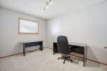 Discover the perfect home office setup in this bright and airy space.