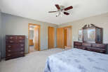 Step into this inviting bedroom, featuring a spacious layout and neutral color palette.