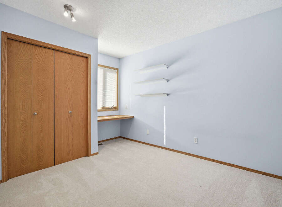 This inviting room features a spacious layout with ample natural light.