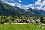 Discover your dream alpine retreat! This stunning property boasts breathtaking views of snow-capped mountains and lush green valleys.