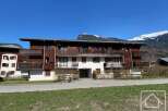 Discover a stunning property nestled in a picturesque mountain setting.