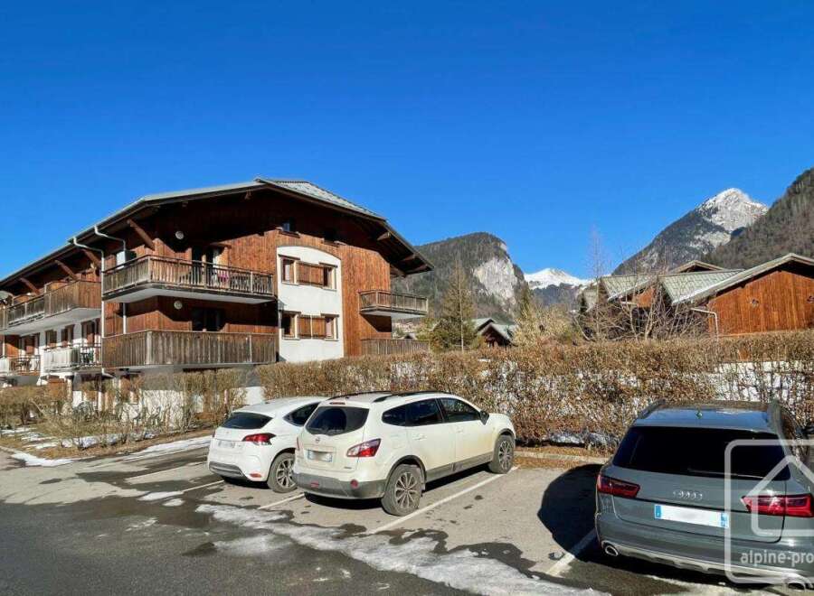 Discover a charming property nestled in a picturesque mountain setting.