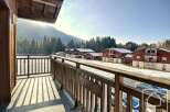Enjoy breathtaking mountain views from this charming property.