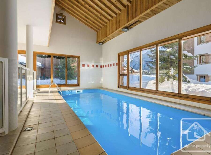 This stunning property boasts a luxurious indoor swimming pool, perfect for year-round enjoyment.
