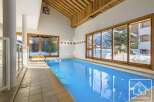 This stunning property boasts a luxurious indoor swimming pool, perfect for year-round enjoyment.