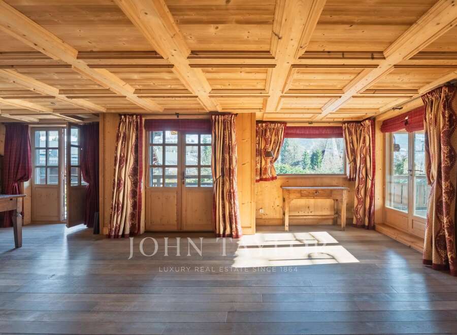 Step into a world of rustic elegance with this stunning property, showcasing exquisite wooden architecture.